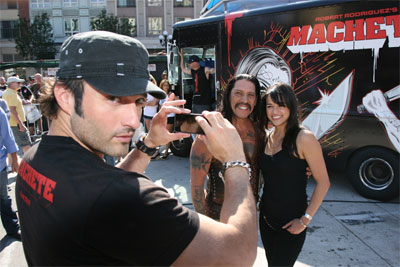 Michelle Rodriguez and Danny Trejo pose for Robert Rodriguez
